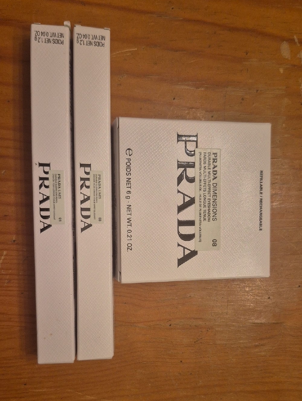 Prada DIMENSIONS 08 Shadow Prada 01 Black Eyeliner Peada 03 MAHPGANY Eue